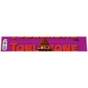 Swiss Milk Chocolate with Raisins & Honey & Almond Nougat - Toblerone